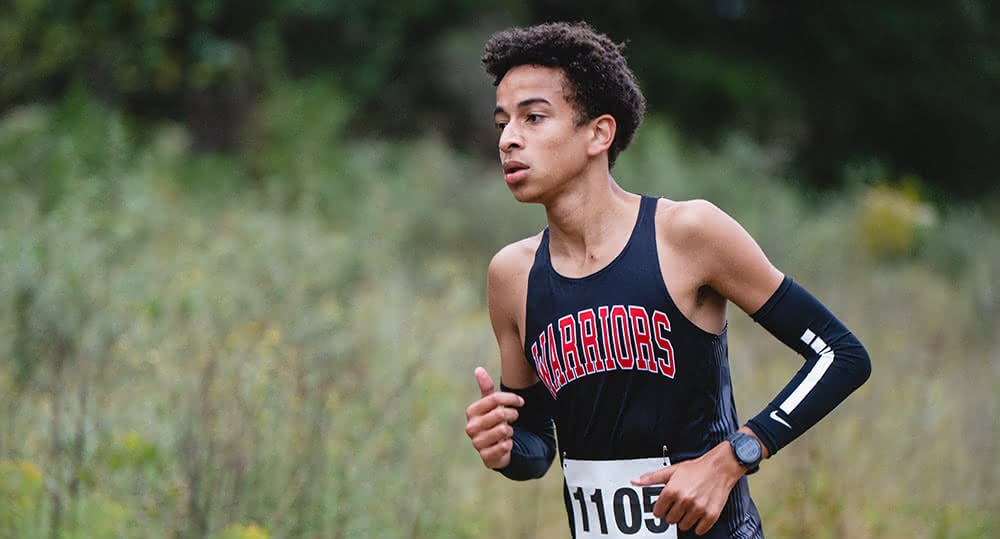 Warrior Cross Country runner