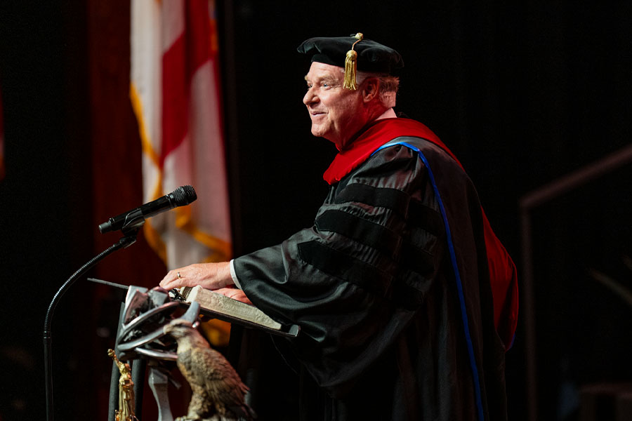 Alumnus giving speech