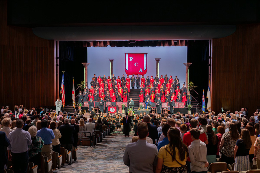 Families watching graduation ceremony