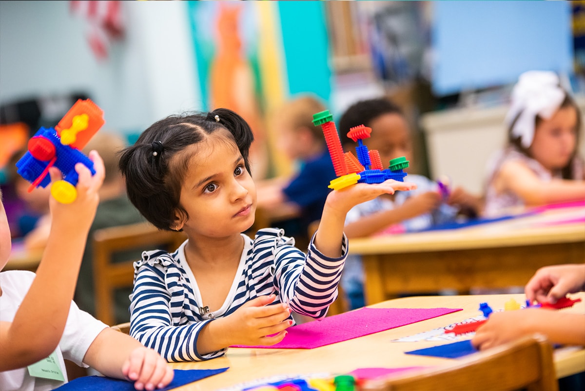 Children building with toys