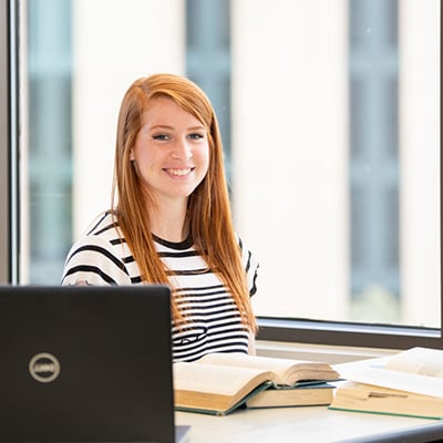 Graduate Assistant Program Ad Image of Girl Smiling