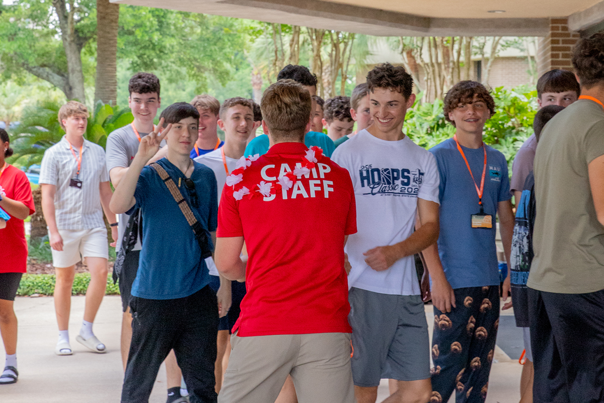 Red Camp Staff Greeting Campers