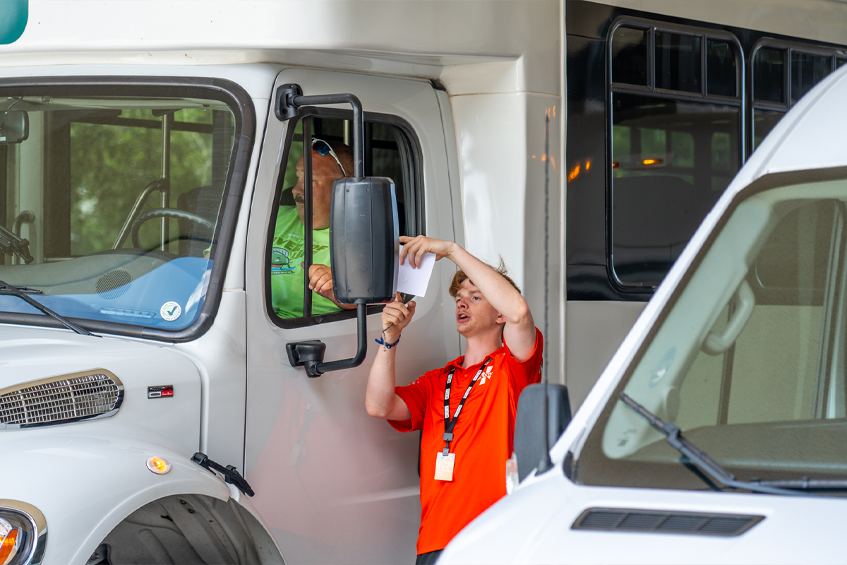 Camp Staff Helping Driver