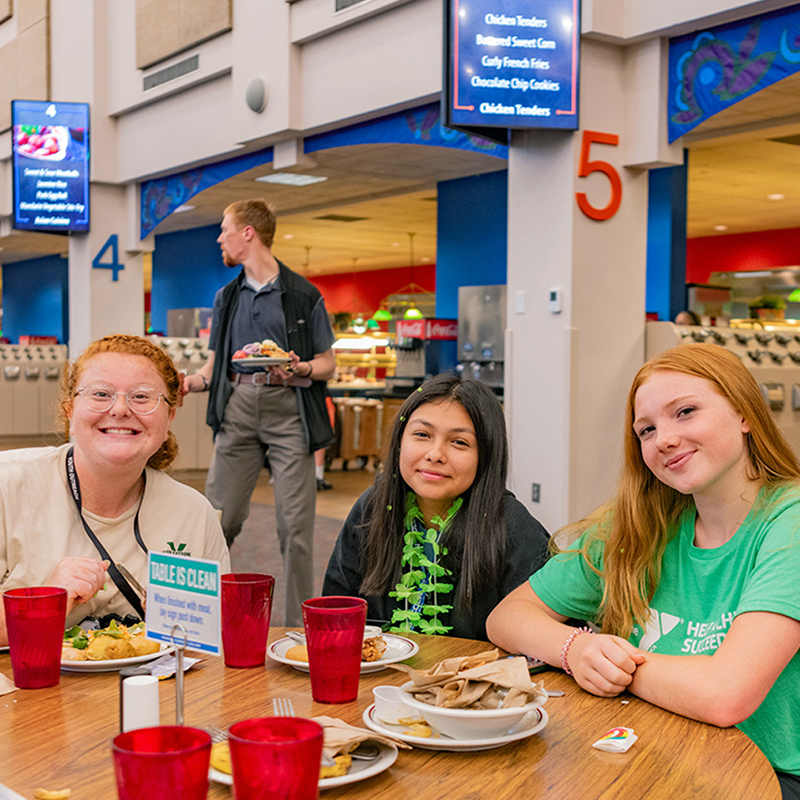 Campers and leader eating in Four Winds