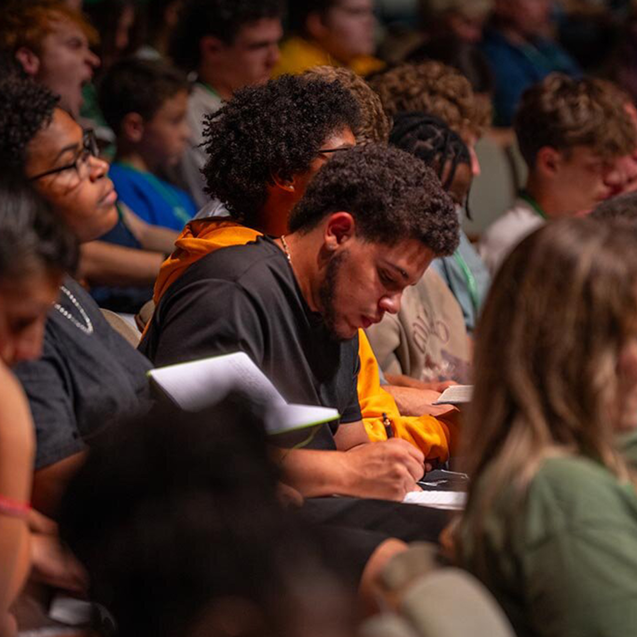Campers taking notes