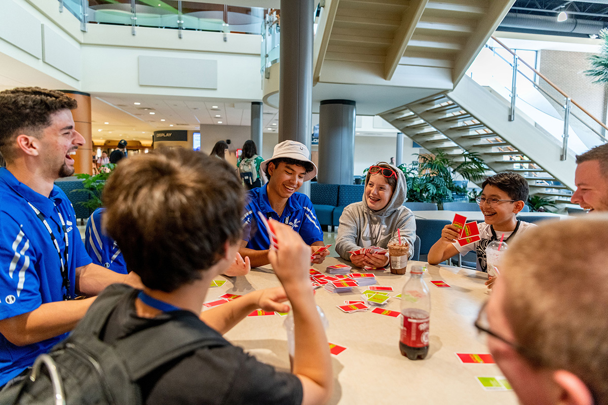 Teen Extreme campers playing Uno